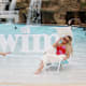 Nicole Williams English and Camille Kostek in Sunflow chairs.